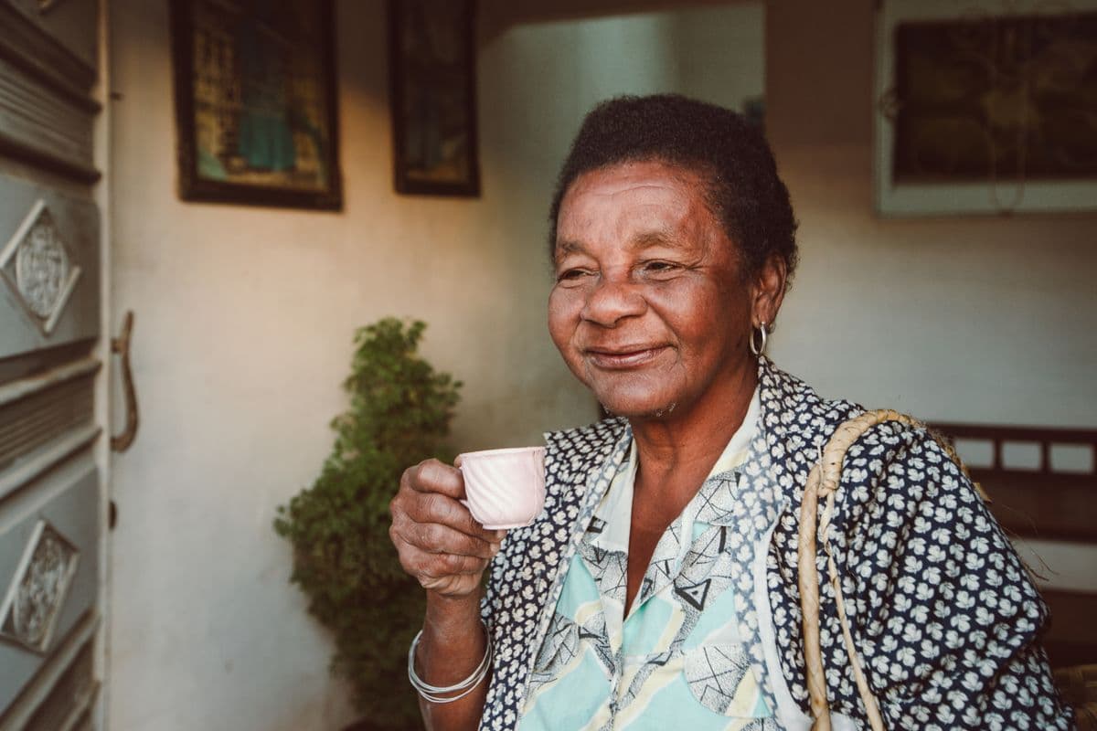 A smiling older patient at home
